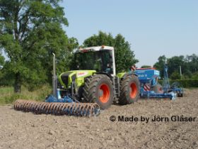 Claas Xerion 3300 mit Solitär 9 und Frontpacker