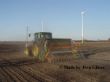 John Deere 6420 mit Gummiwalze