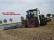 Claas Xerion mit Lemken Kurzscheibenegge